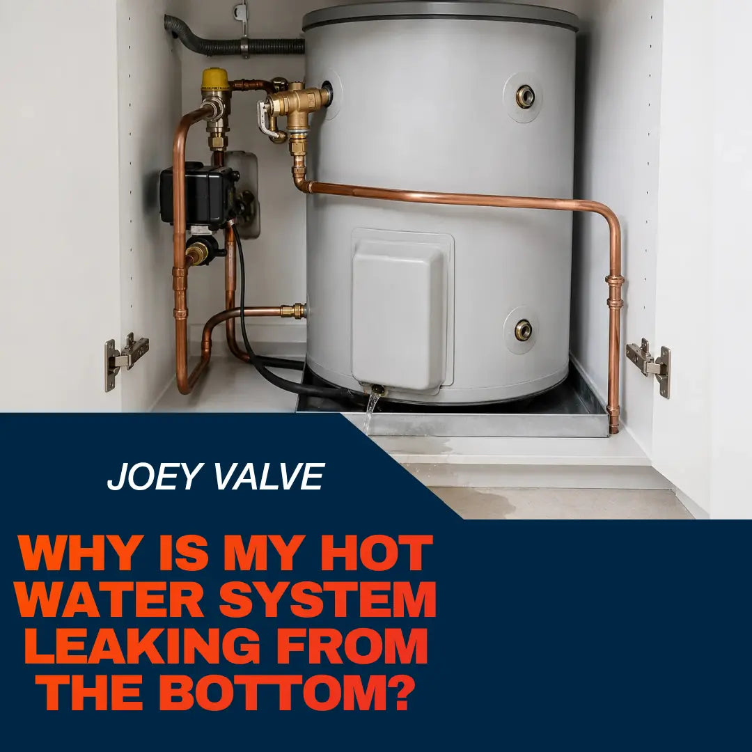 Leaking indoor hot water system with water dripping from the base into a drain tray
