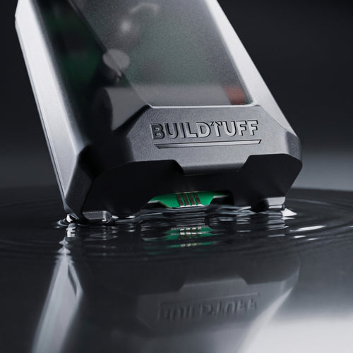 The sensor sits in the tray. When water touches the conta...